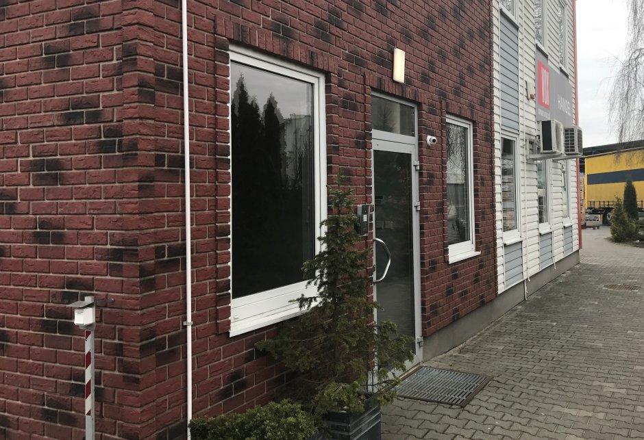 Отделка фасада панелями под кирпич