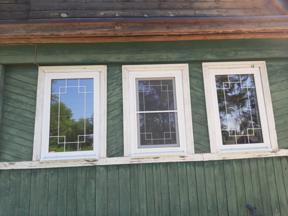 Наличники на окна в деревенском доме