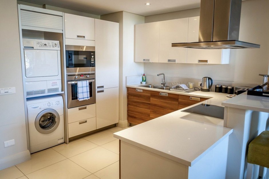 Встроенная стиральная машина под духовкой