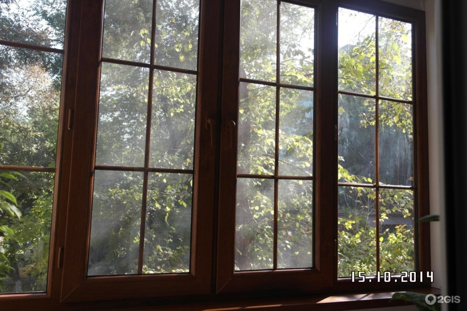 Деревянные окна с раскладкой