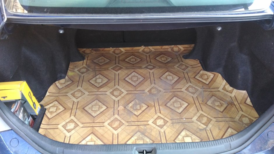 Коврик в багажник из линолеума