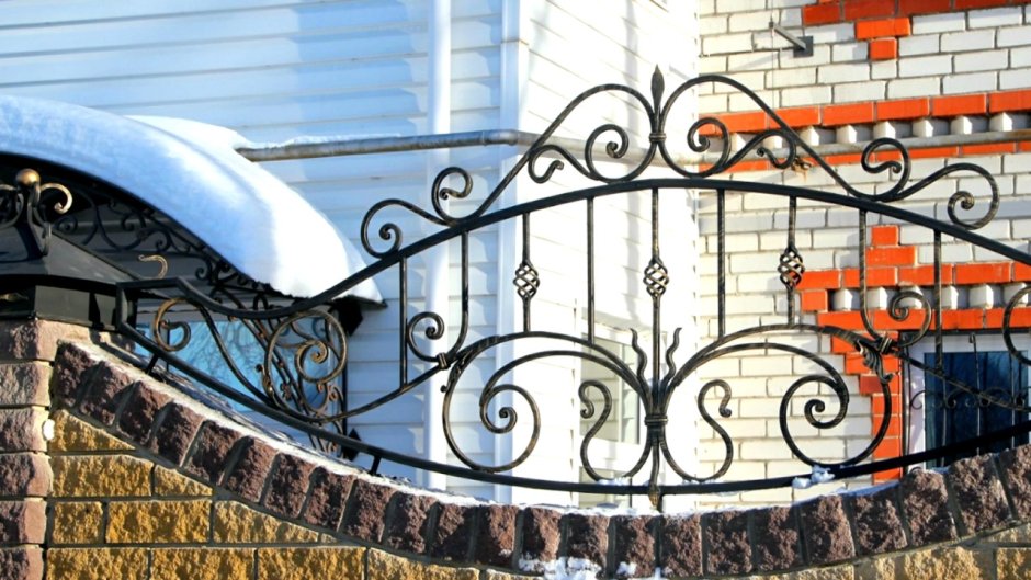 Надзаборники кованые