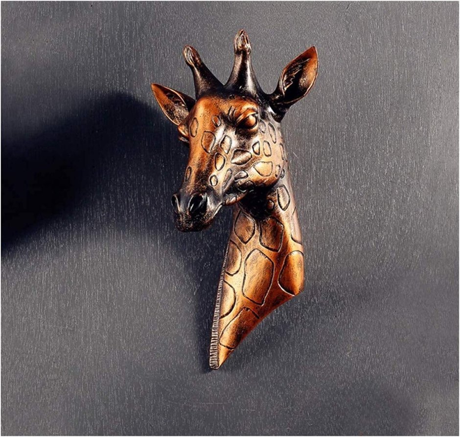 Голова жирафа скульптура