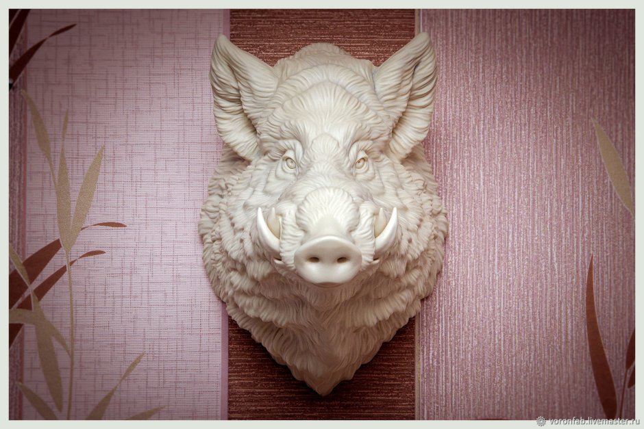 Скульптура головы животных