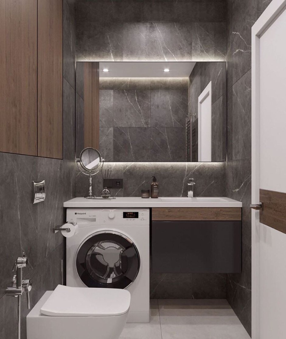 Интерьер туалета с раковиной и стиральной машиной