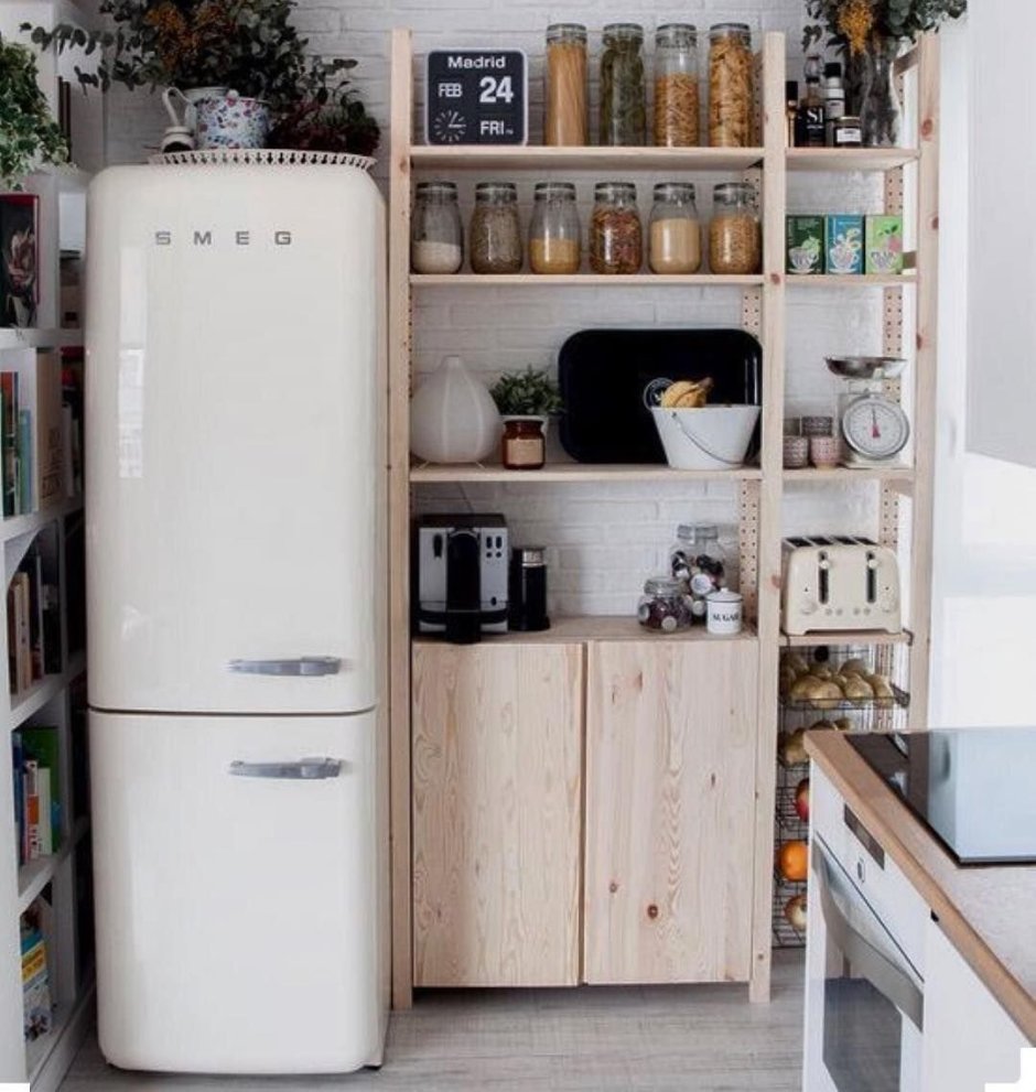 Холодильник в шкафу в прихожей