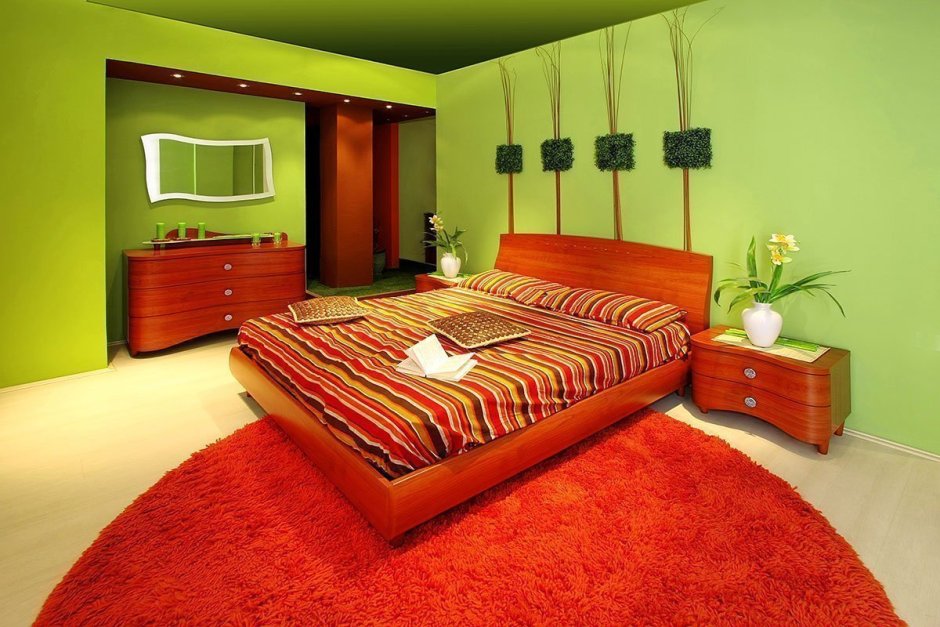 Интерьер спальни в квартире в оранжевом цвете