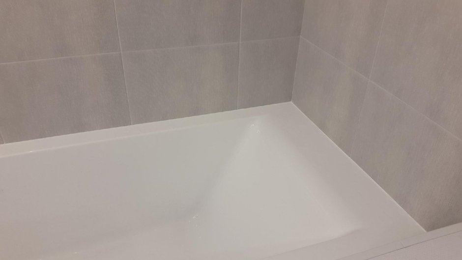 Уголок примыкание плитки к ванной