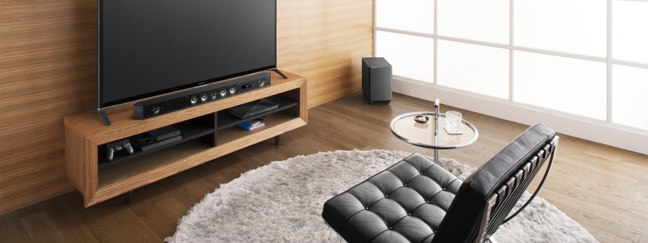 ТВ тумба с телевизором и саундбаром фото