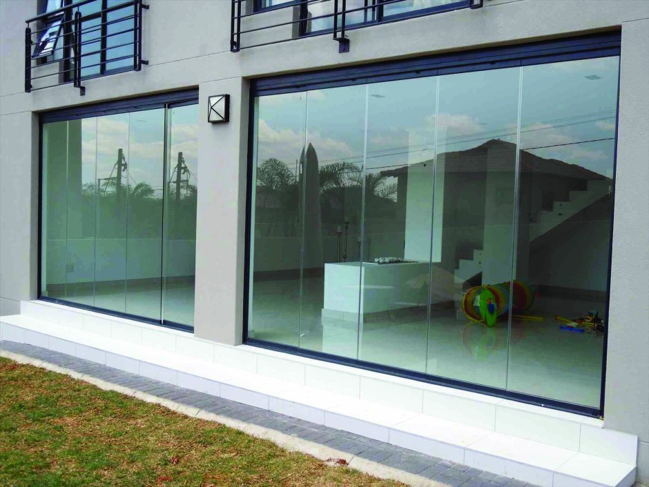 Слайдинг Безрамное остекление