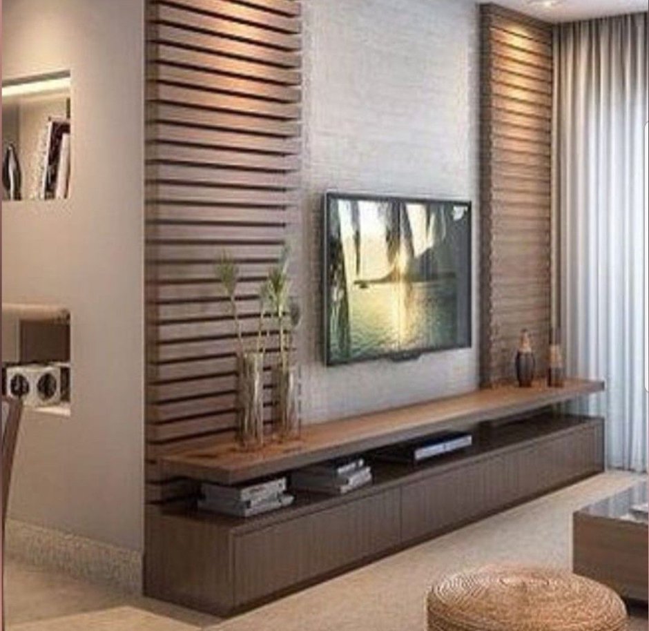 Рейки на стене с телевизором