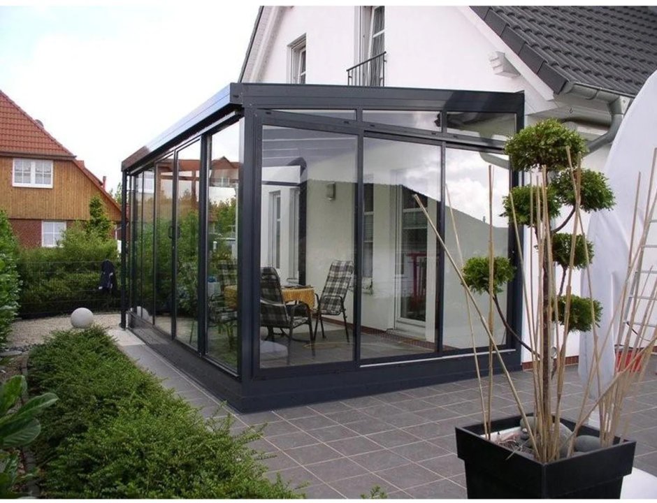 Стеклянный пристрой к дому