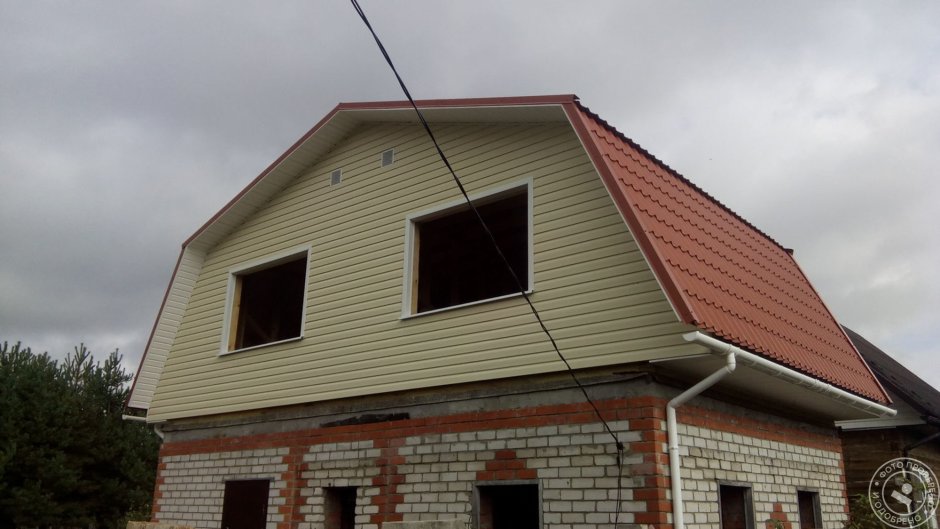 Водосток на мансардной крыше