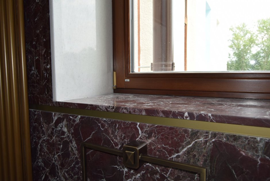 Керамогранит на откосах окна