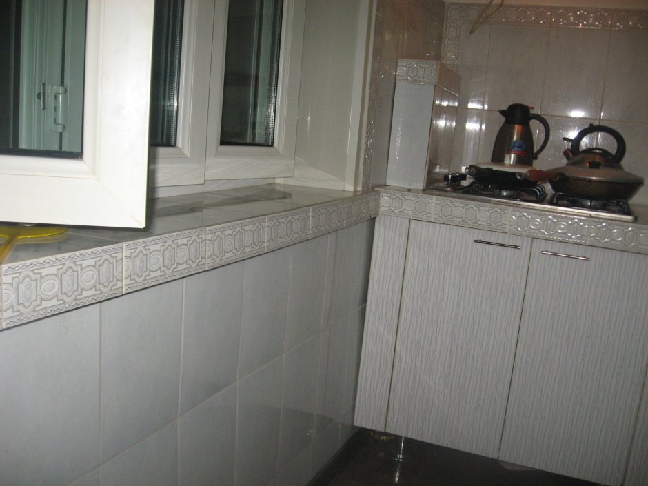 Подоконник и откосы из плитки