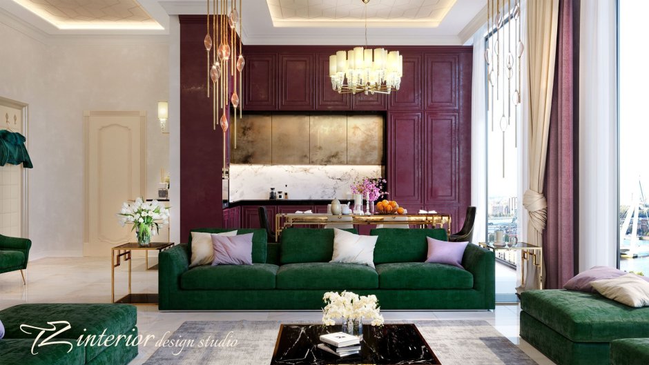 Изумрудный диван в интерьере кухни гостиной