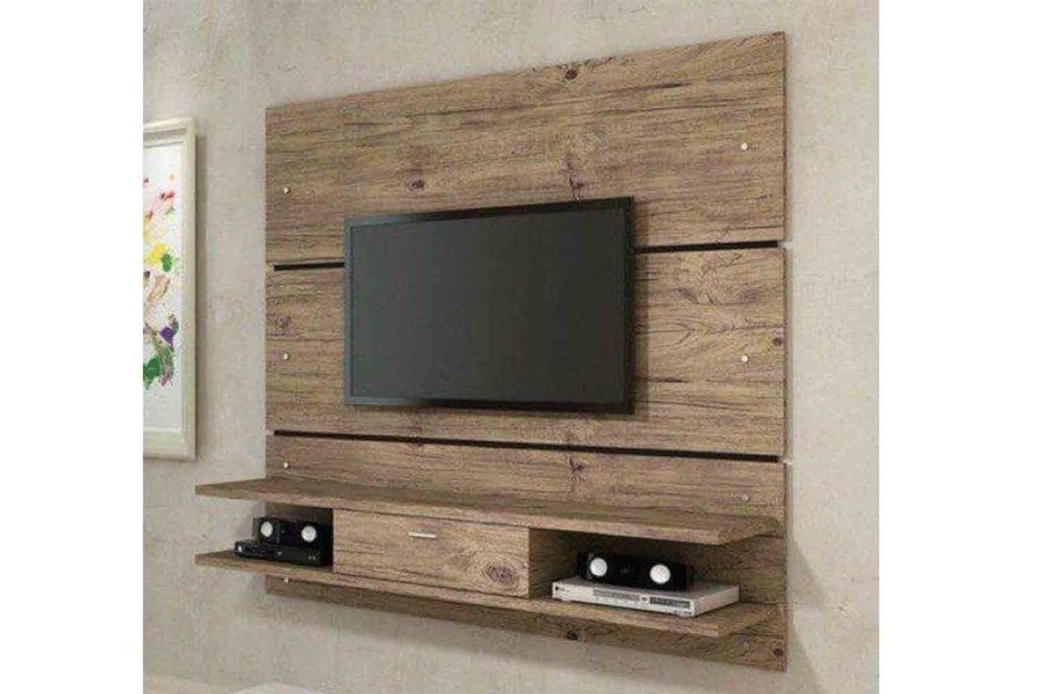 Телевизор на деревянной стене