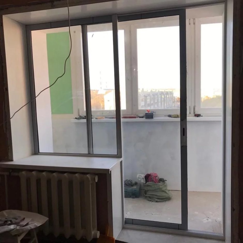 Раздвижная балконная дверь с окном